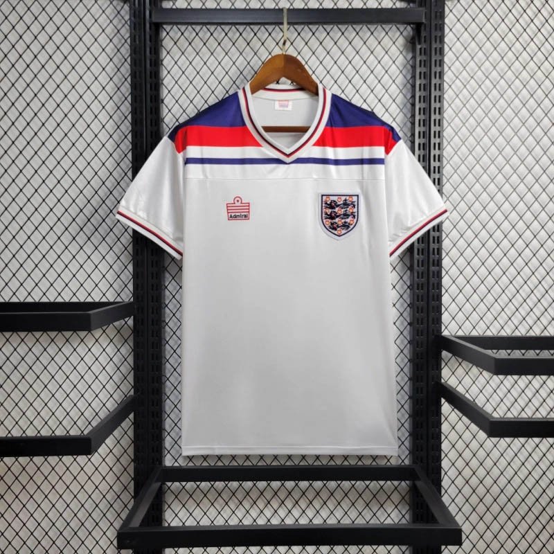 425f3b3853fb3089bbffdb4cde0e148f-1 1982 Retro England Home Soccer Jersey - Image 1