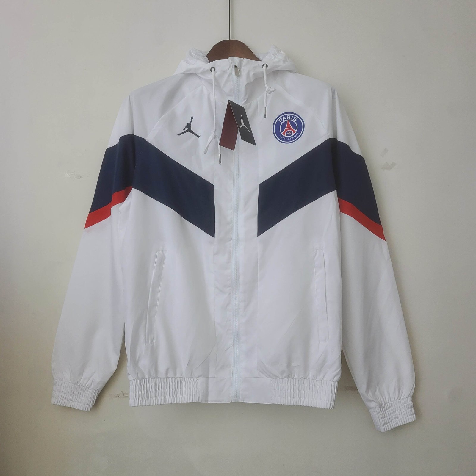 47dbbc631b0c77b607d07e4bf0c85bef 2022/2023 PSG Windbreaker White - Image 1