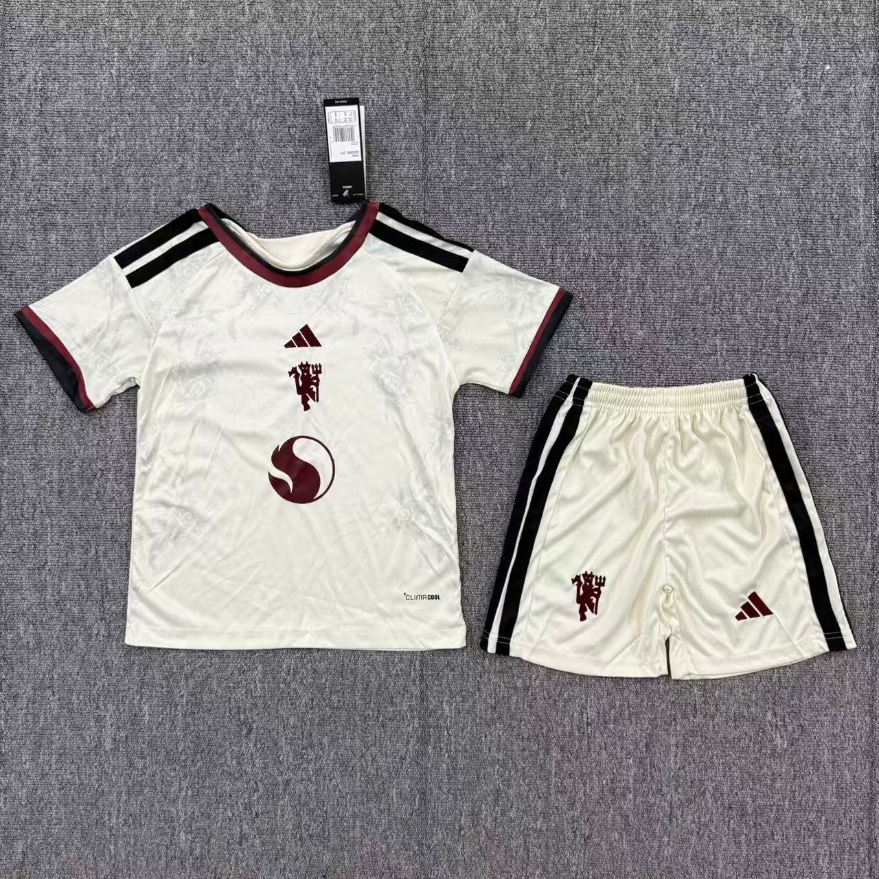 IMG_6027 2026-2027 Manchester United Third Away Apricot kids/youth Soccer uniform - Image 1